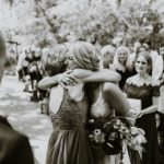 Bride hugging mum
