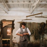 Groom getting dressed