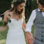 Holding hands in paddock