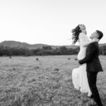 Bride and groom in paddock