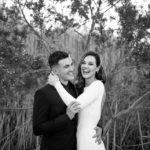 Bride and groom laughing