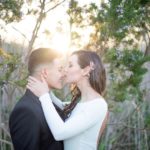 Bride kissing grooms nose