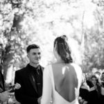 Groom looking at bride