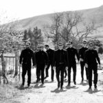 Guys walking down to forest